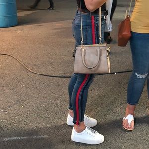 Express distressed denim with red stripe